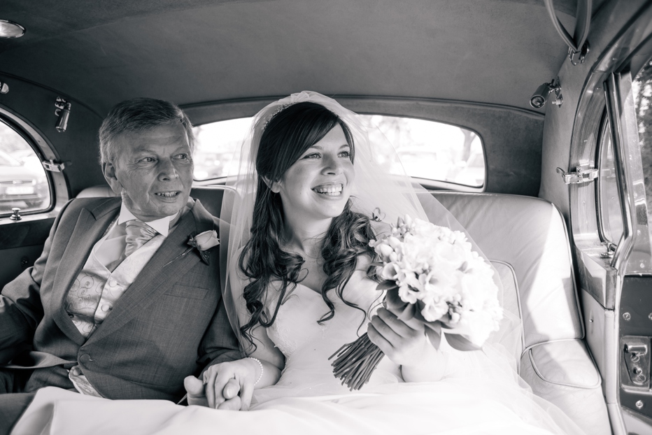 Bride in Bentley with Father