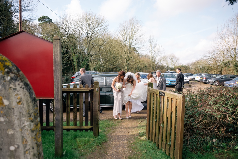 Bride leaving church wedding in Hampshire
